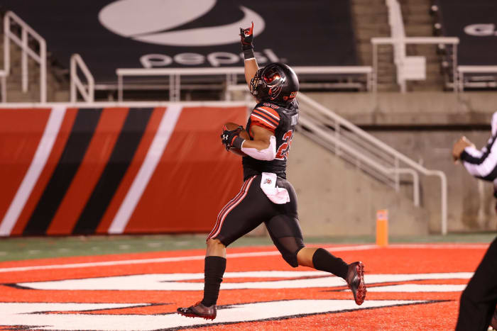 Nov 21, 2020; Salt Lake City, Utah, USA; Utah Utes linebacker Nephi Sewell (29) points to the sky as he runs into the end zone against the USC Trojans during the second quarter at Rice-Eccles Stadium.
